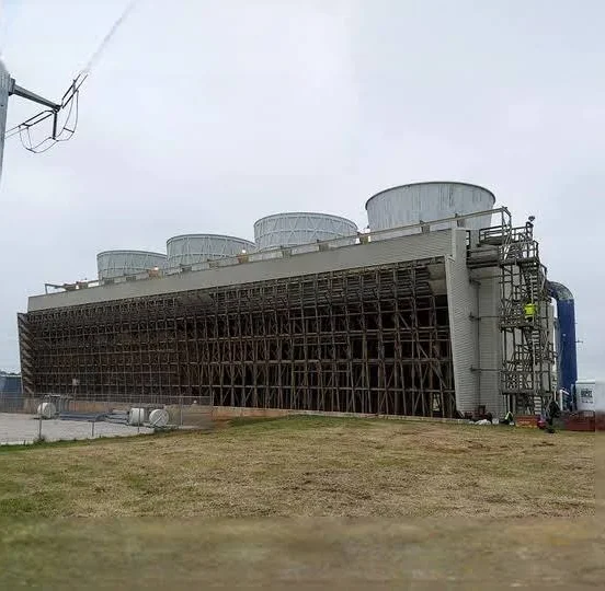 Large multi-cell industrial crossflow cooling tower with fan stacks